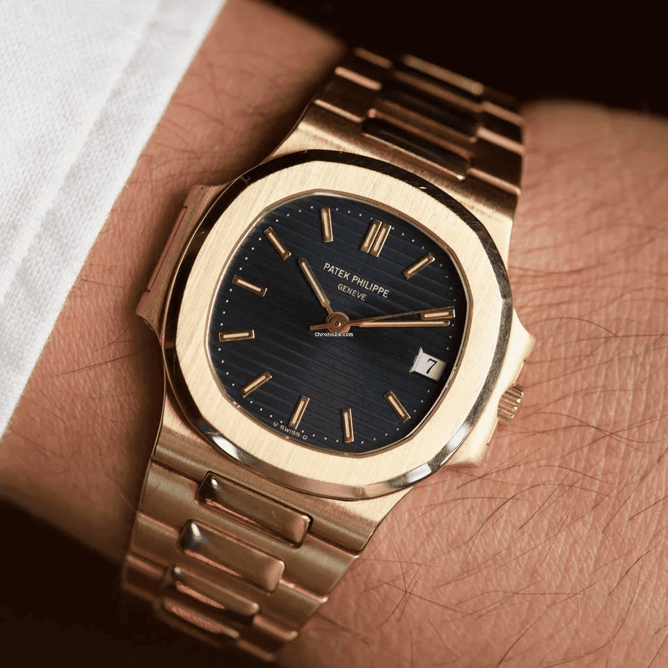 Patek Philippe: Nautilus 3800/1J-017 Yellow Gold Black Dial (2003)