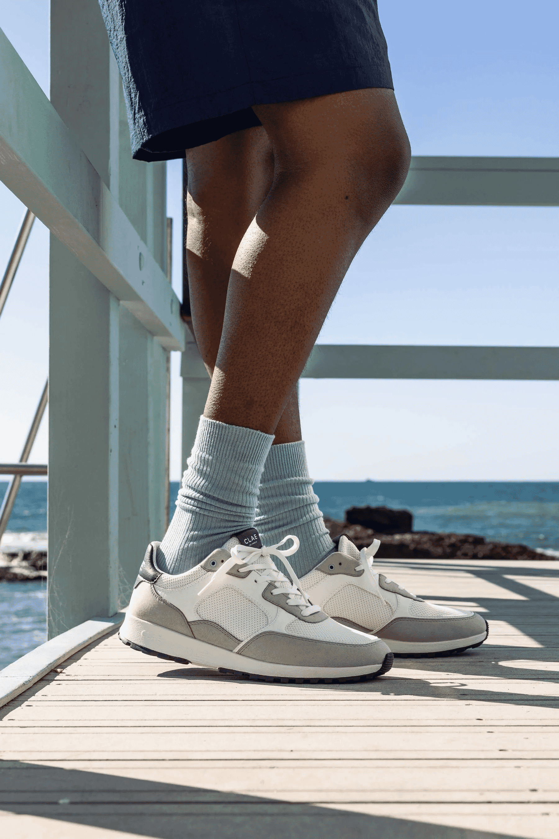 CLAE: JOSHUA Microchip White Navy Trainer