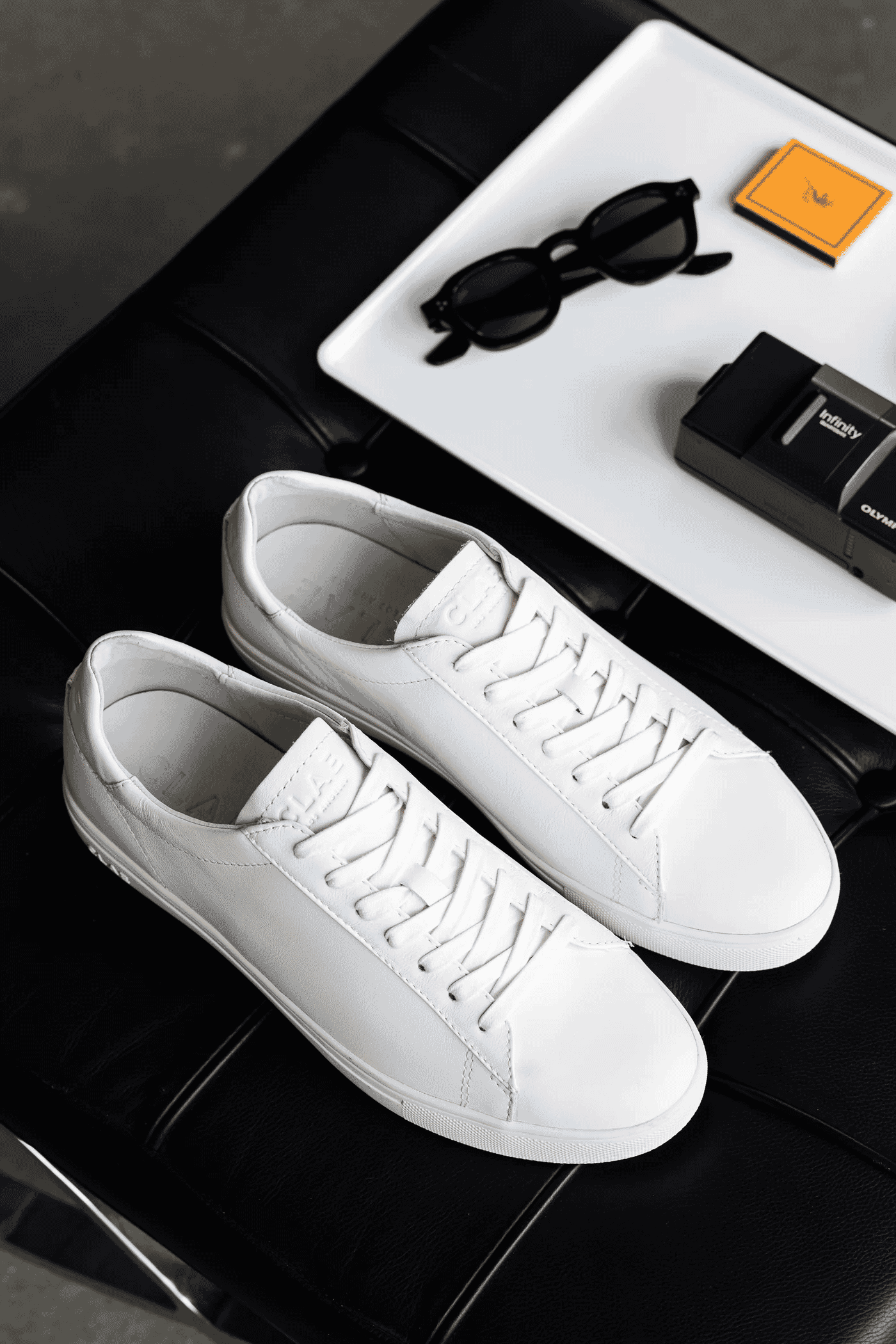 CLAE: Triple White Leather Sneaker