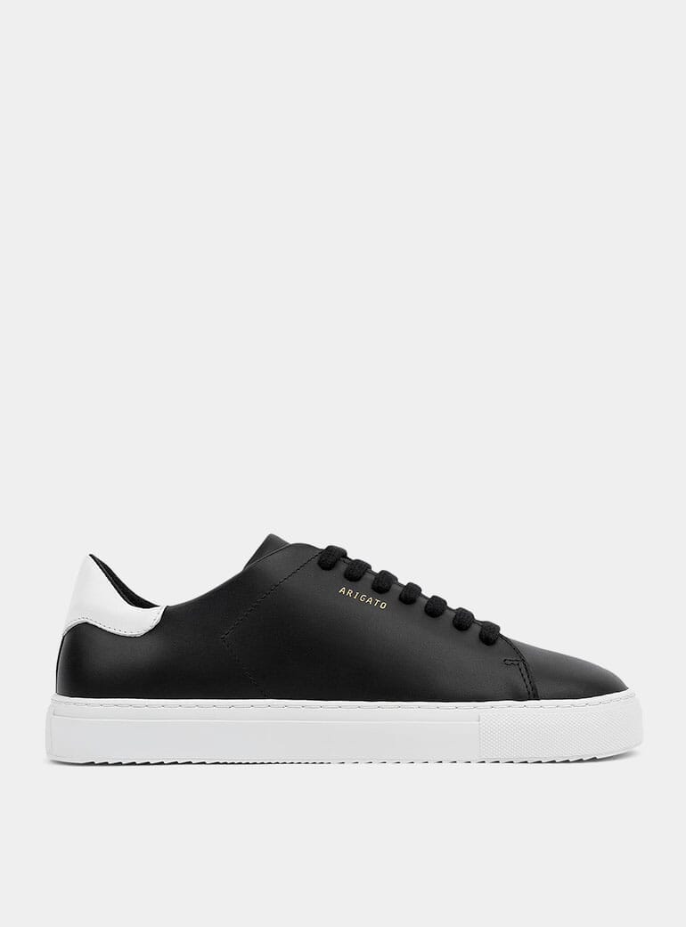 black and beige trainers