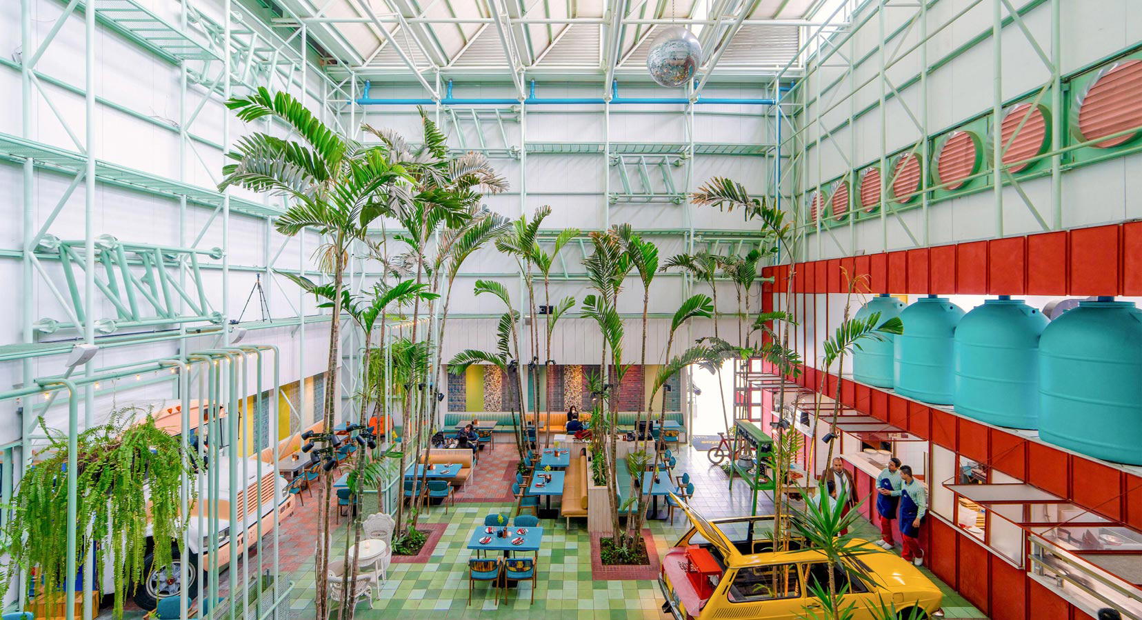 An Urban Oasis: Taller Ken Transforms Madero Café with Tropical Plants & Vintage Cars