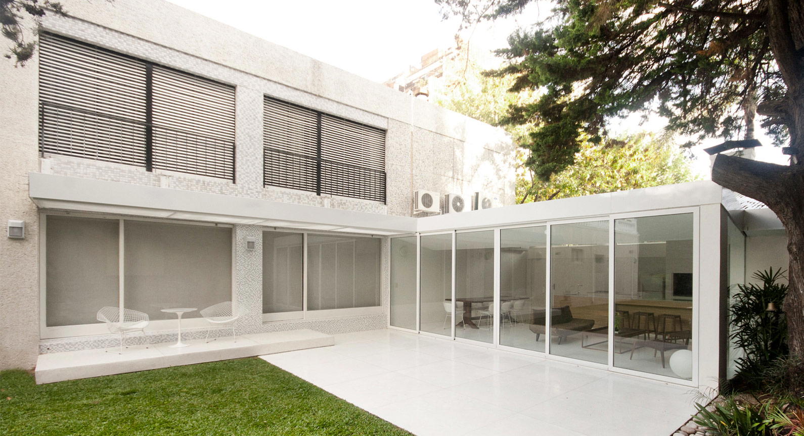 Effortless Serenity: Take A Look Inside This Pristine White Garden Extension