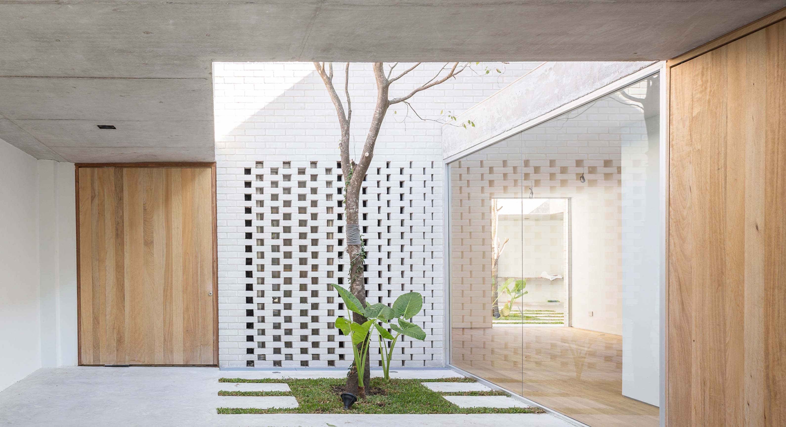 How Indoor Courtyards Embrace The Residents Of The Newman House