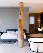 This Moldovan Penthouse Features A Tree Trunk In Bedroom