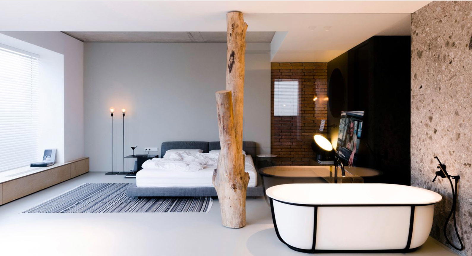This Moldovan Penthouse Features A Tree Trunk In Bedroom