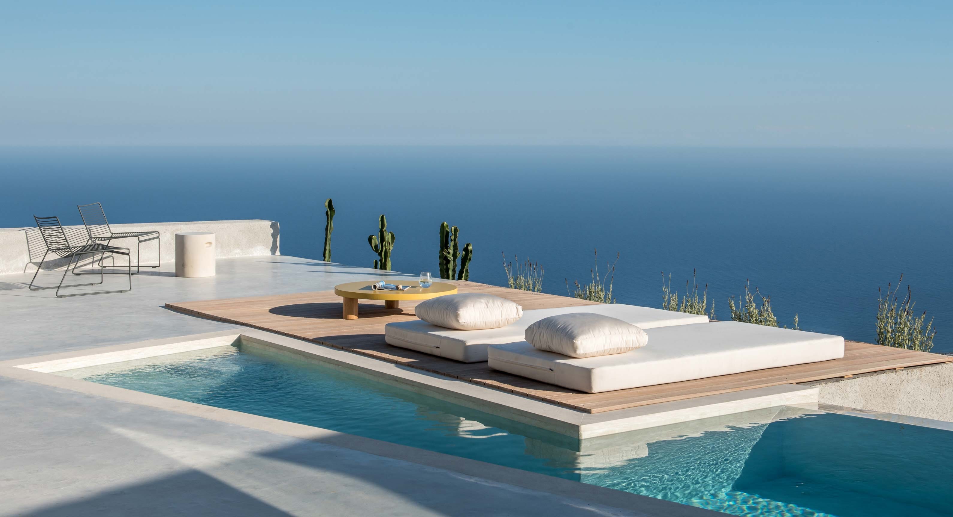 Nestled in Santorini’s Mountainside: The Holiday Home of Dreams