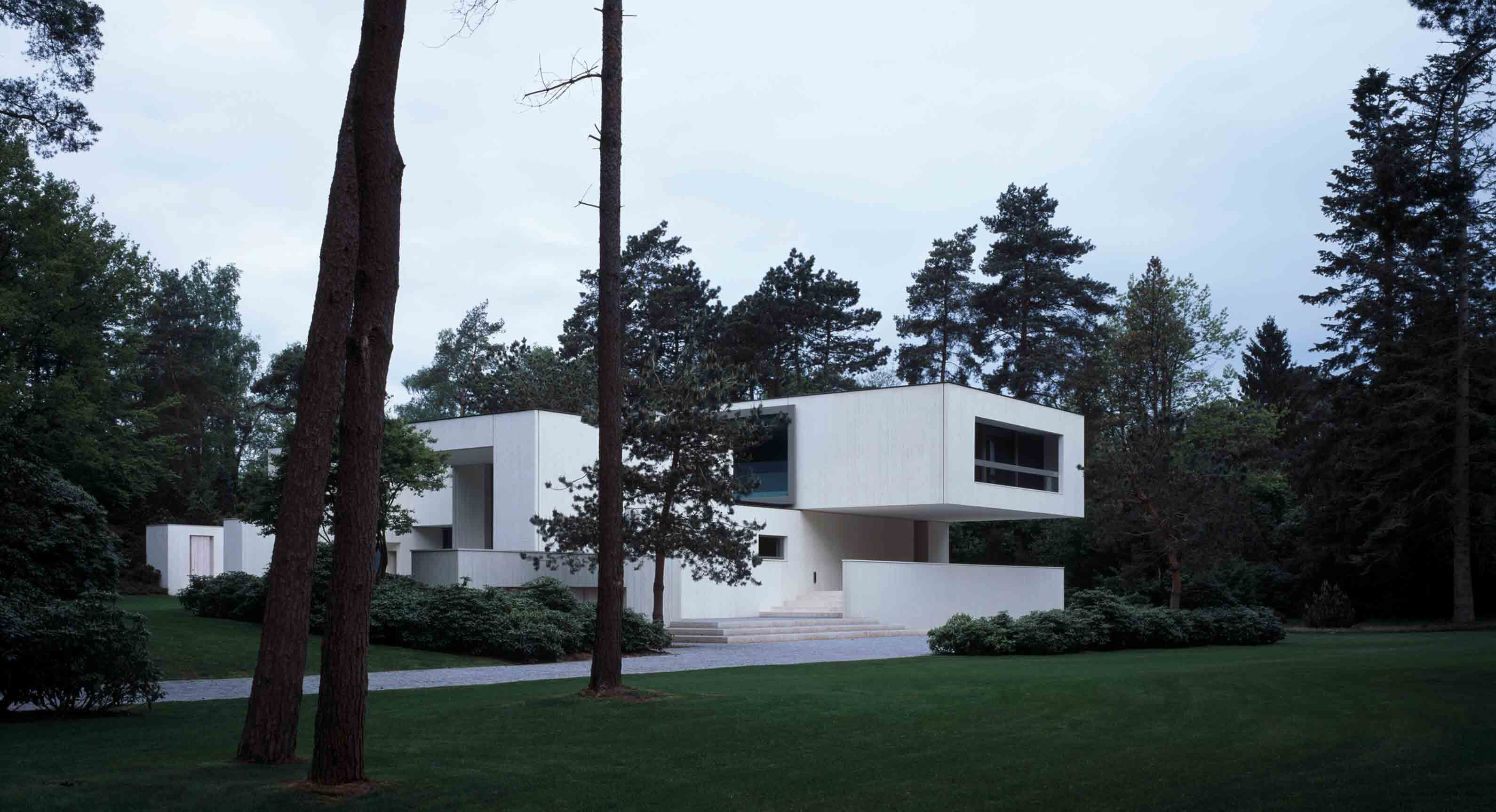 Villa Waalre: A Pared-Back Concrete Home In The Heart Of A Dutch Forest  