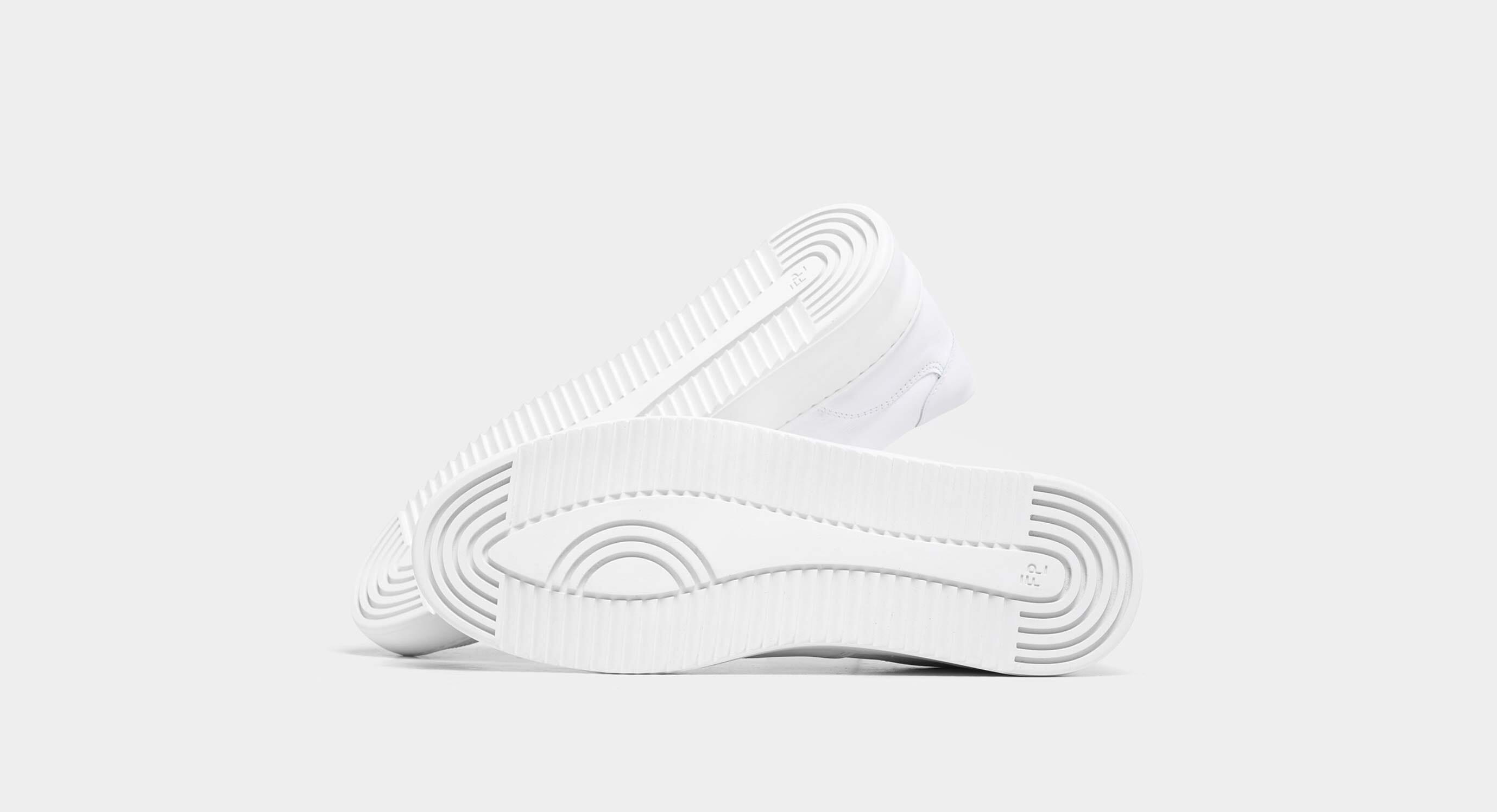 3 Pairs Of Sneakers That You Can Wear With A Suit