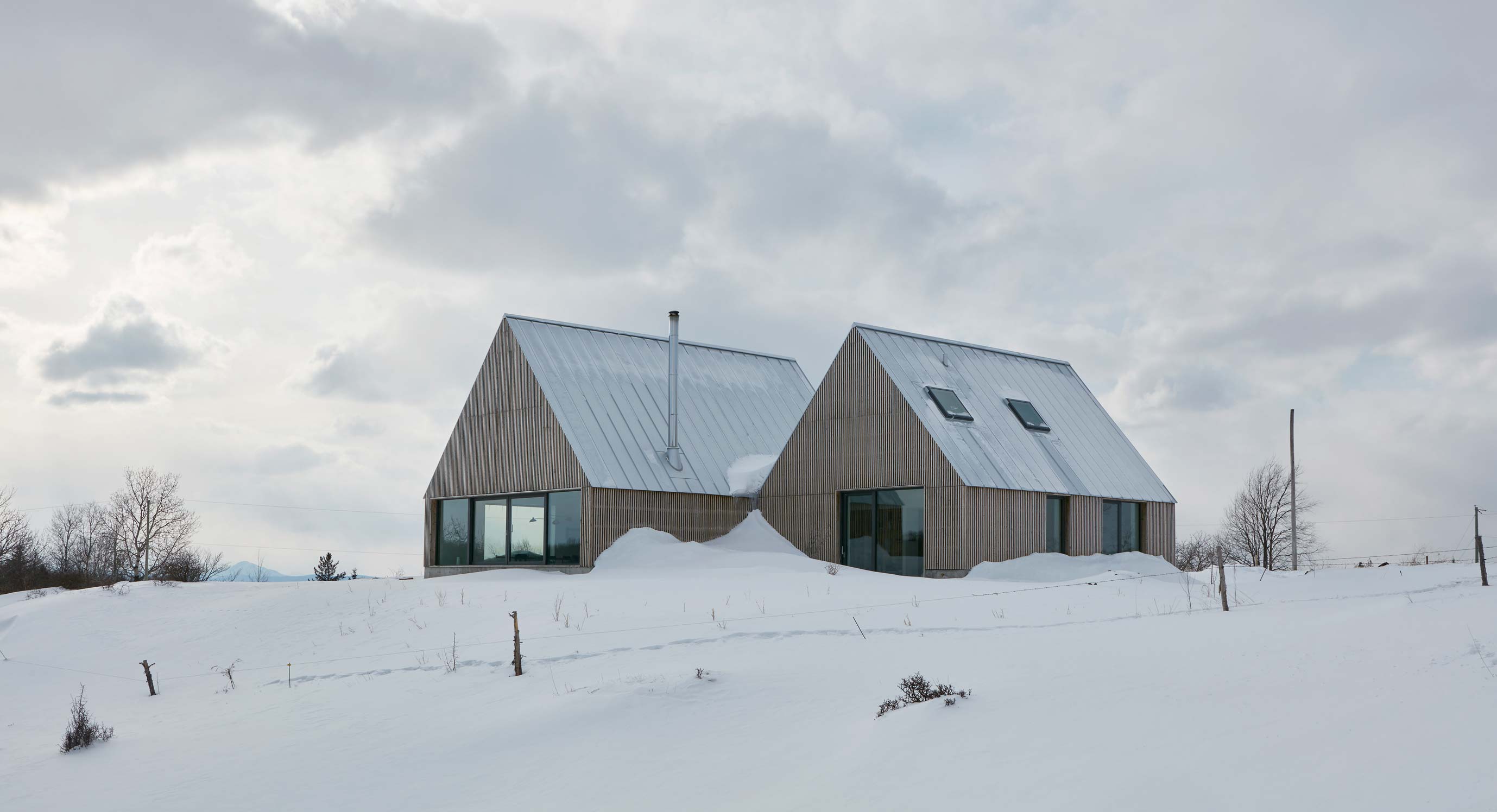 Hatley Residence's Traditional Gabled Roofing Hides Modern Interiors