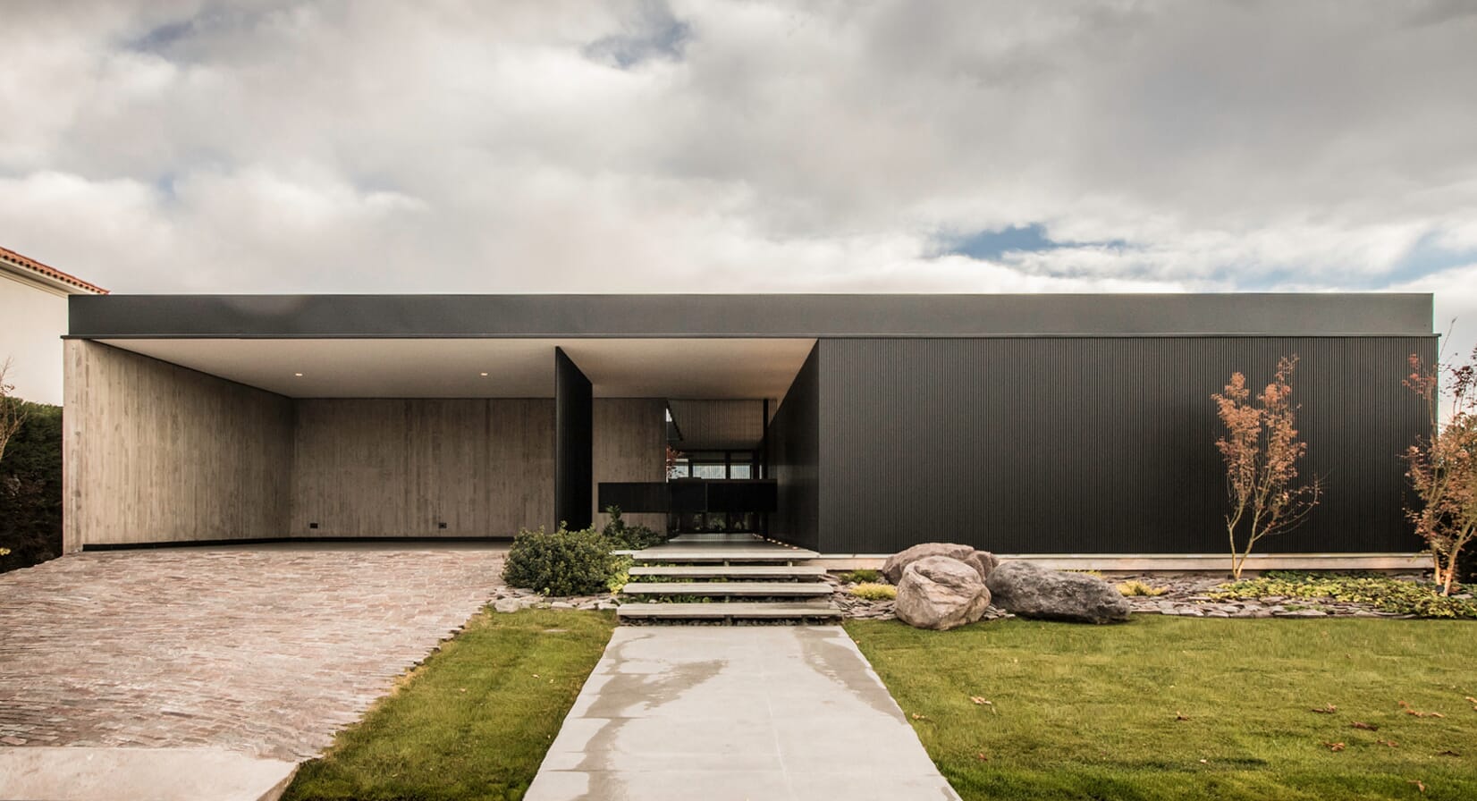LL House offers a protective shell for a courtyard