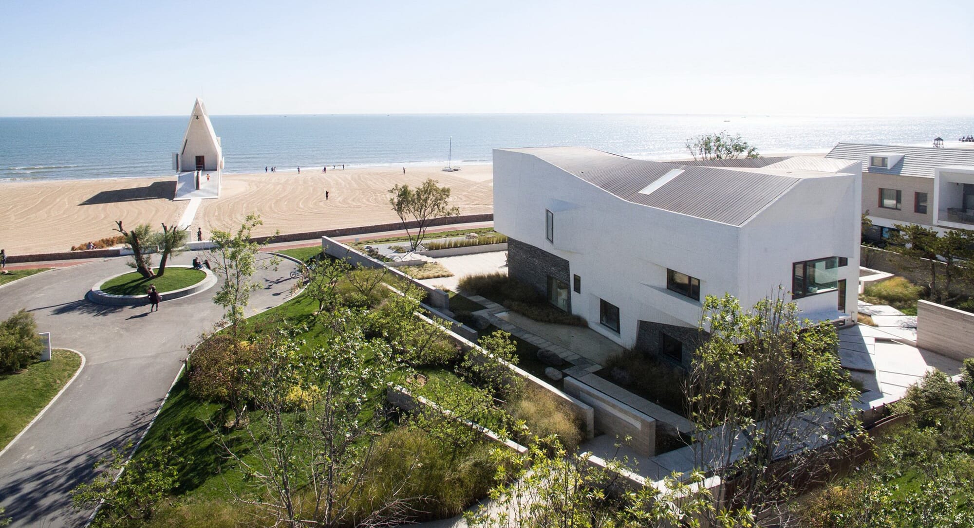 House T: Striking Angles in local materials