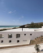 The House of the Infinite: A stone beach house with an incredible roof terrace