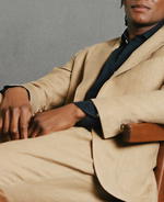 Channel summer elegance in Drake's linen suits