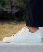 How to pull off sneakers at a summer wedding