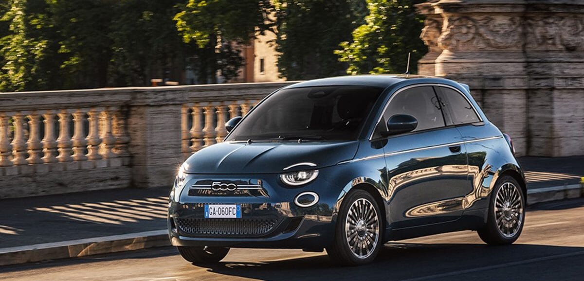 Blue Fiat on bridge