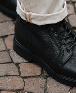 Step into style with 10 black boots worth buying