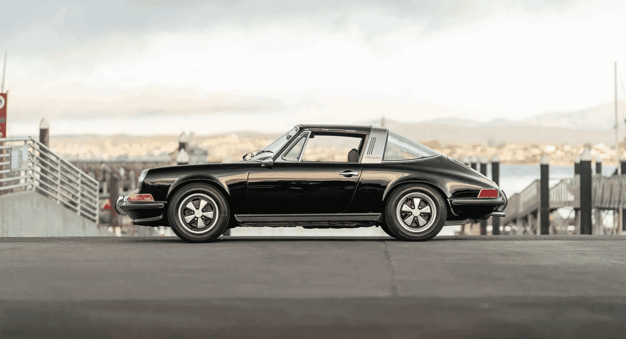 Ewan McGregor waves goodbye to his 1972 Porsche 911 Targa
