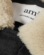 Unpacking the timeless appeal of black coats