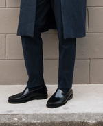 Penny for your thoughts: Black penny loafers set to soar this season