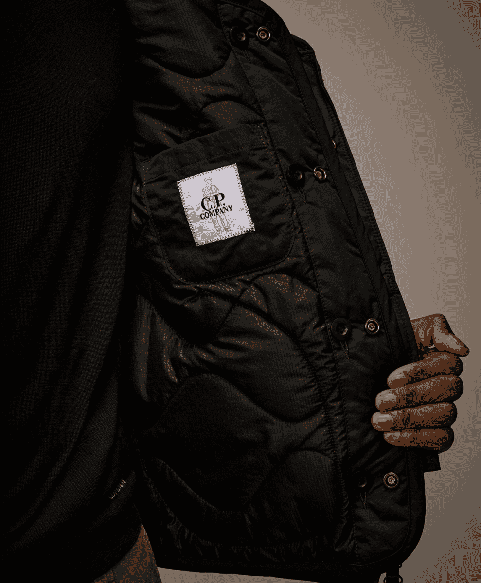 Junya Watanabe MAN x C.P. Company Has Us Praying for Rain ss25 black vest gilet